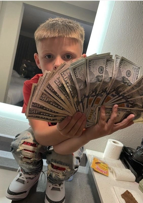 Kid Holding Money Pfp